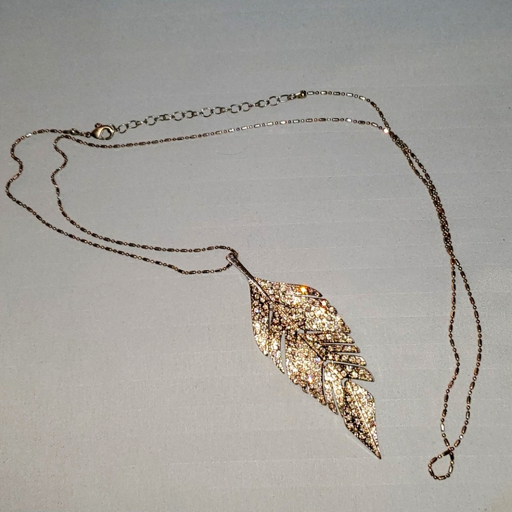 Long silver and crystal leaf necklace